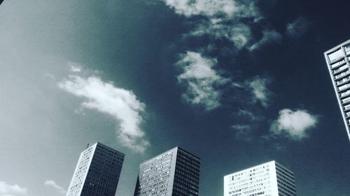 Low angle view of skyscrapers against sky