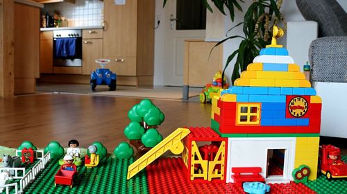 Multi colored toy on table at home