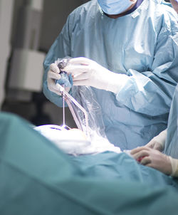 Midsection of surgeon in operating room
