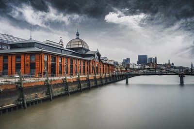 View of river with buildings in background