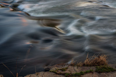Close-up of water flowing through rocks