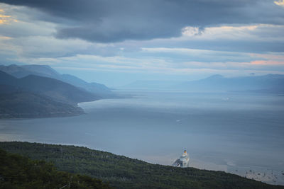 High angle view of mountain and sea against sky