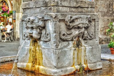 Close-up of statue by fountain