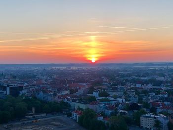 High angle view of townscape against sky during sunset