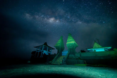 Scenic view of sea against sky at night