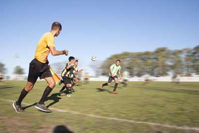 Soccer match lineman running