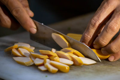 Midsection of man preparing food