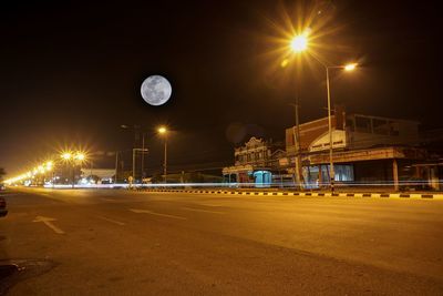 Illuminated street lights at night