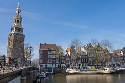 City scenic from amsterdam in the netherlands with the montelbaan tower