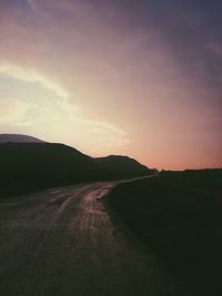 Scenic view of landscape against sky during sunset