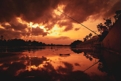 Scenic view of dramatic sky during sunset