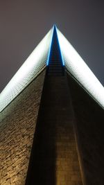 Low angle view of office building against sky