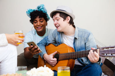 Young man playing guitar