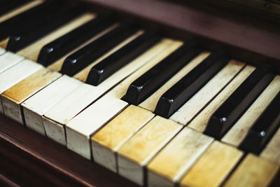 High angle view of weathered piano keys