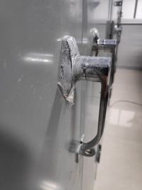 High angle view of faucet in water