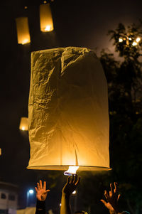 People holding launching lantern in loy krathong festival in chiang mail thailand