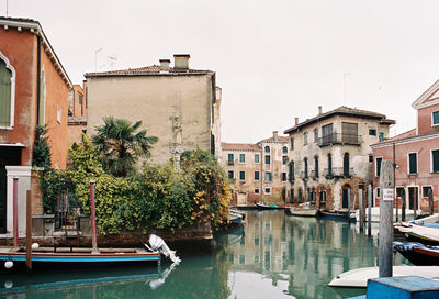 Boats moored at waterfront