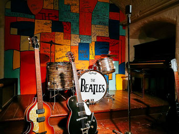 Full frame shot of guitar against wall