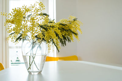 Close-up of yellow flower at home