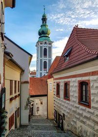 Exterior of buildings in city against sky