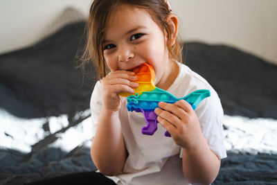 Portrait of a girl holding ice cream