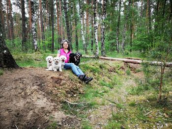 Man with dog in the forest