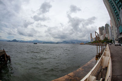 Panoramic view of bay against sky