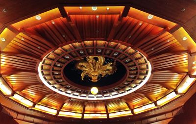 Low angle view of illuminated ceiling