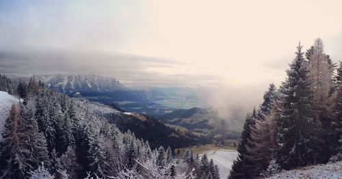 Scenic view of snow covered mountain against sky