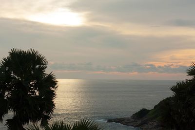 Scenic view of sea against sky at sunset