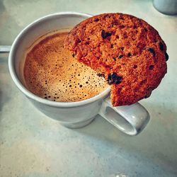 High angle view of coffee cup on table