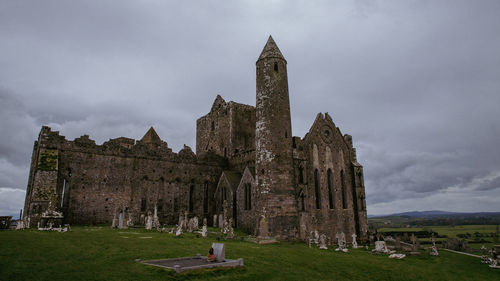 Low angle view of old ruins against sky