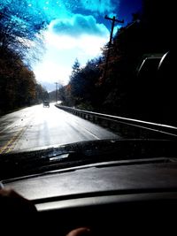 Road seen through car windshield