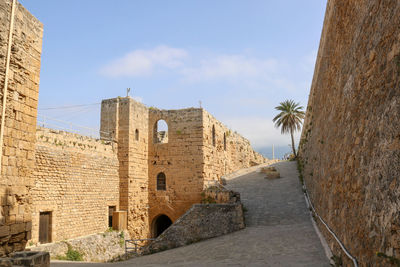 Low angle view of old ruins against clear sky