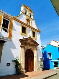 Facade of building against blue sky