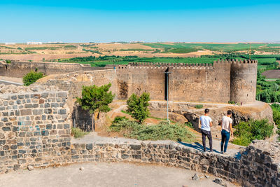 Group of people in front of historical building