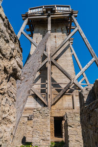 Low angle view of old building against clear sky