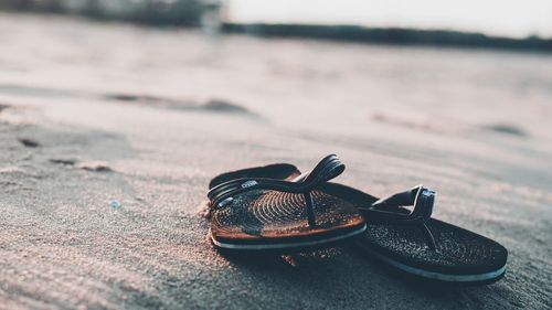 Close-up of shoes on table