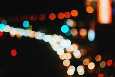 Defocused image of illuminated lights at night