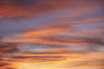 Low angle view of dramatic sky during sunset