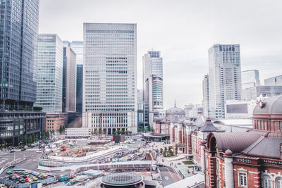 Cityscape against sky at tokyo station