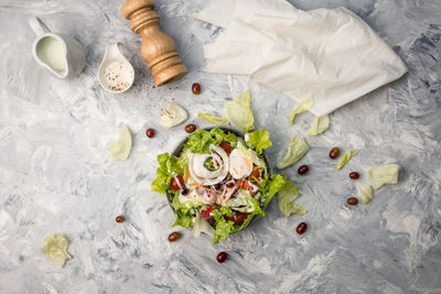 Directly above shot of salad in plate over table