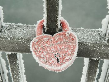 High angle view of love lock on railing during winter