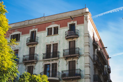 Low angle view of residential building against sky