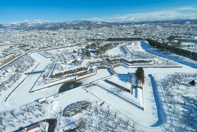 Aerial view of snowcapped cityscape