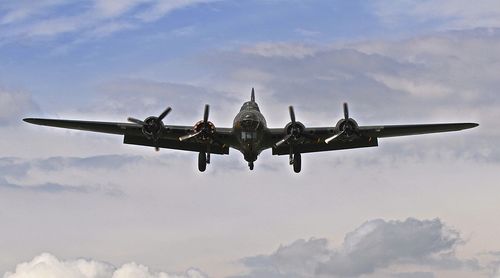 B 17 bomber jet in cloudy sky