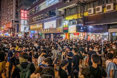 People on street at night