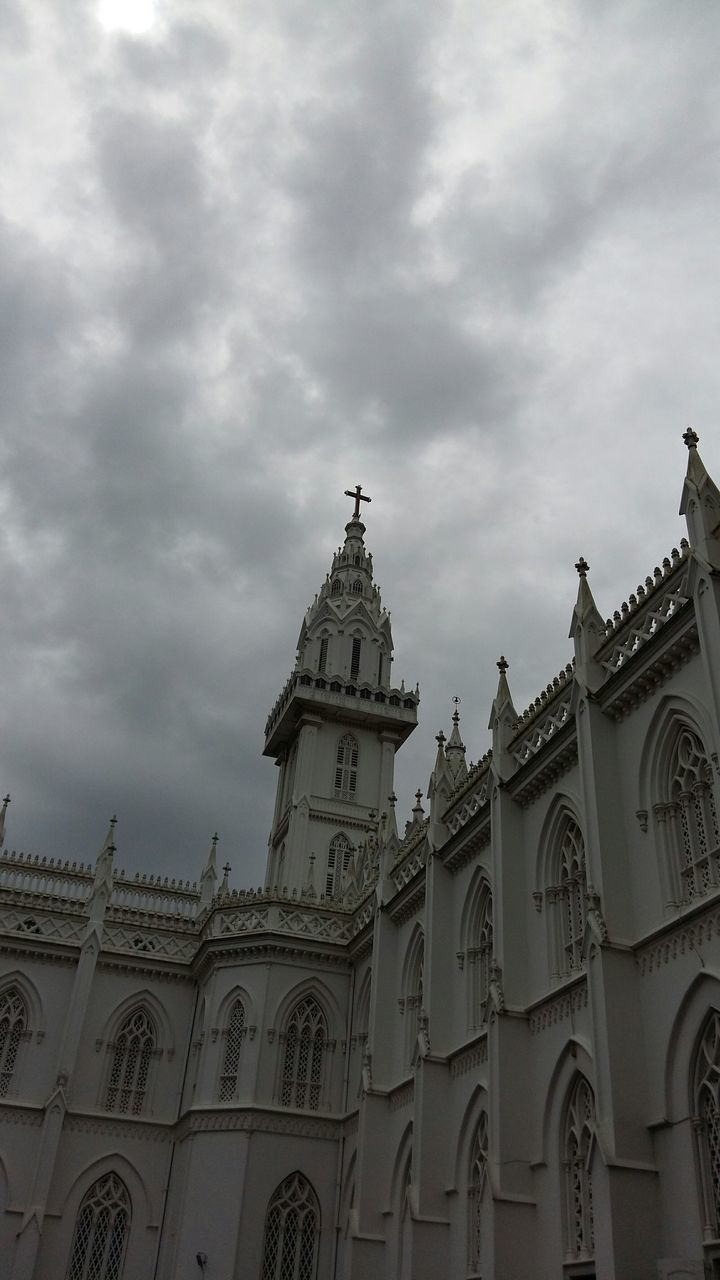 architecture, built structure, place of worship, religion, building exterior, church, spirituality, sky, low angle view, cloud - sky, cathedral, cloudy, history, cloud, cross, dome, arch, high section