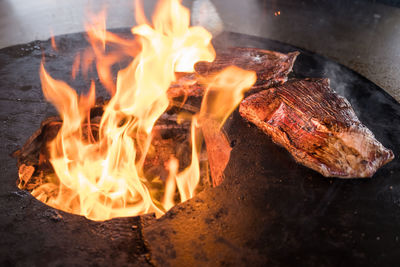 Close-up of bonfire on barbecue grill