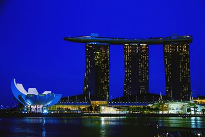 Illuminated modern building in city at night